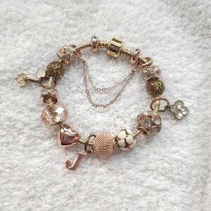 Charm bracelet rose gold colour. Pandora vibes